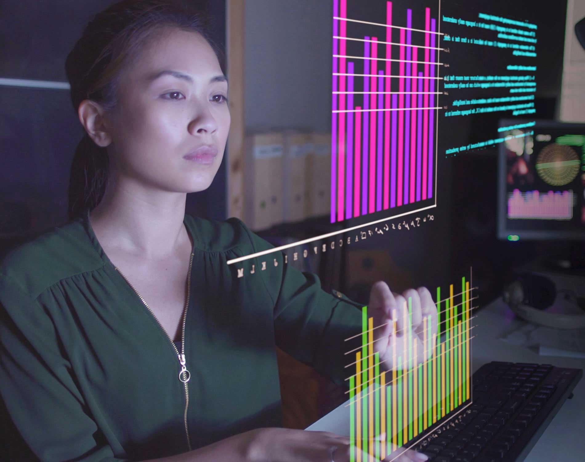 Woman at desk with technology